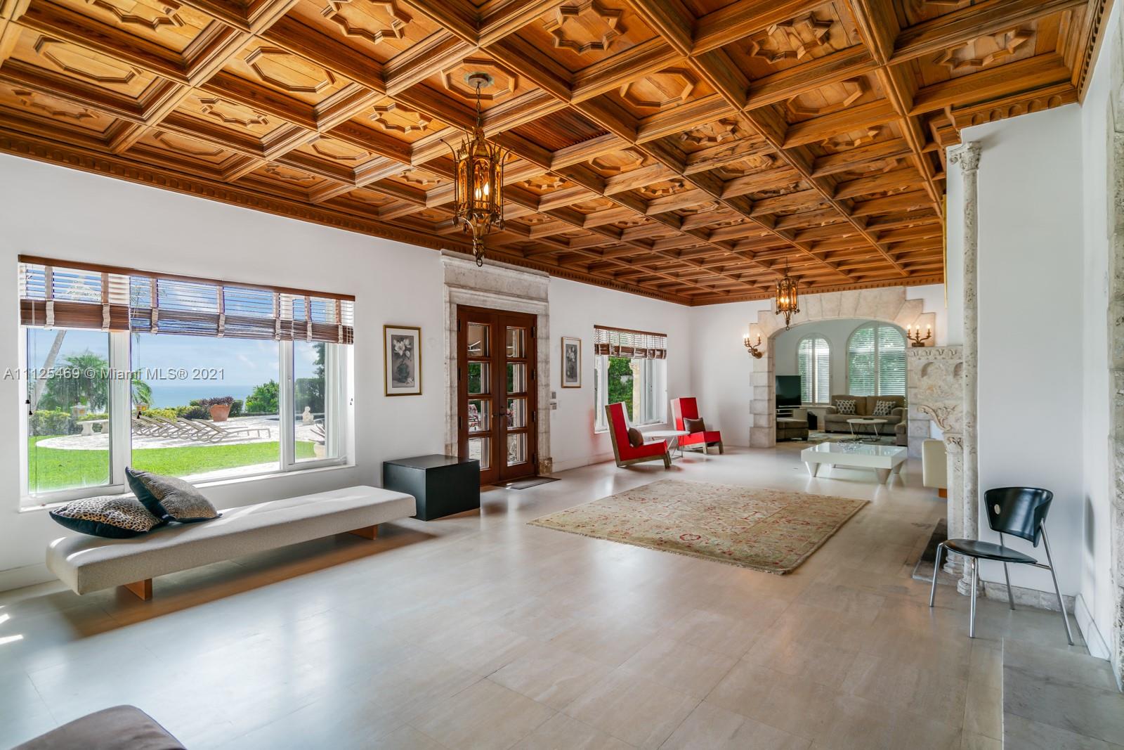 3029 Brickell Avenue Miami, FL 33133 - Photo 28 of 41 a living room with furniture and a large window