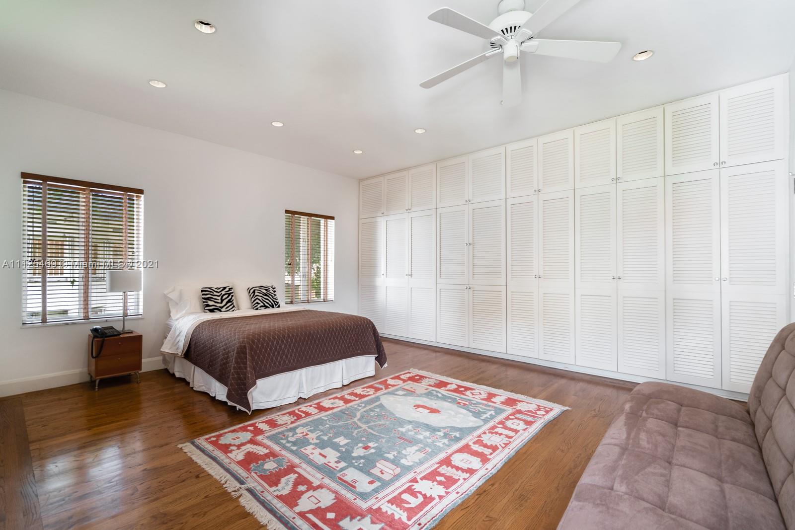 3029 Brickell Avenue Miami, FL 33133 - Photo 39 of 41 a bedroom with bed and a window