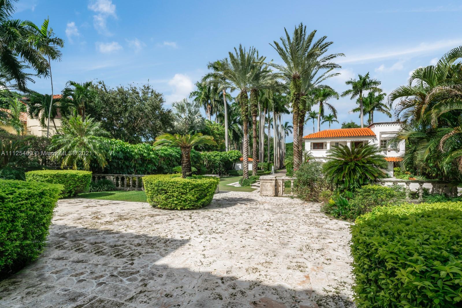 3029 Brickell Avenue Miami, FL 33133 - Photo 9 of 41 a view of a backyard with a garden