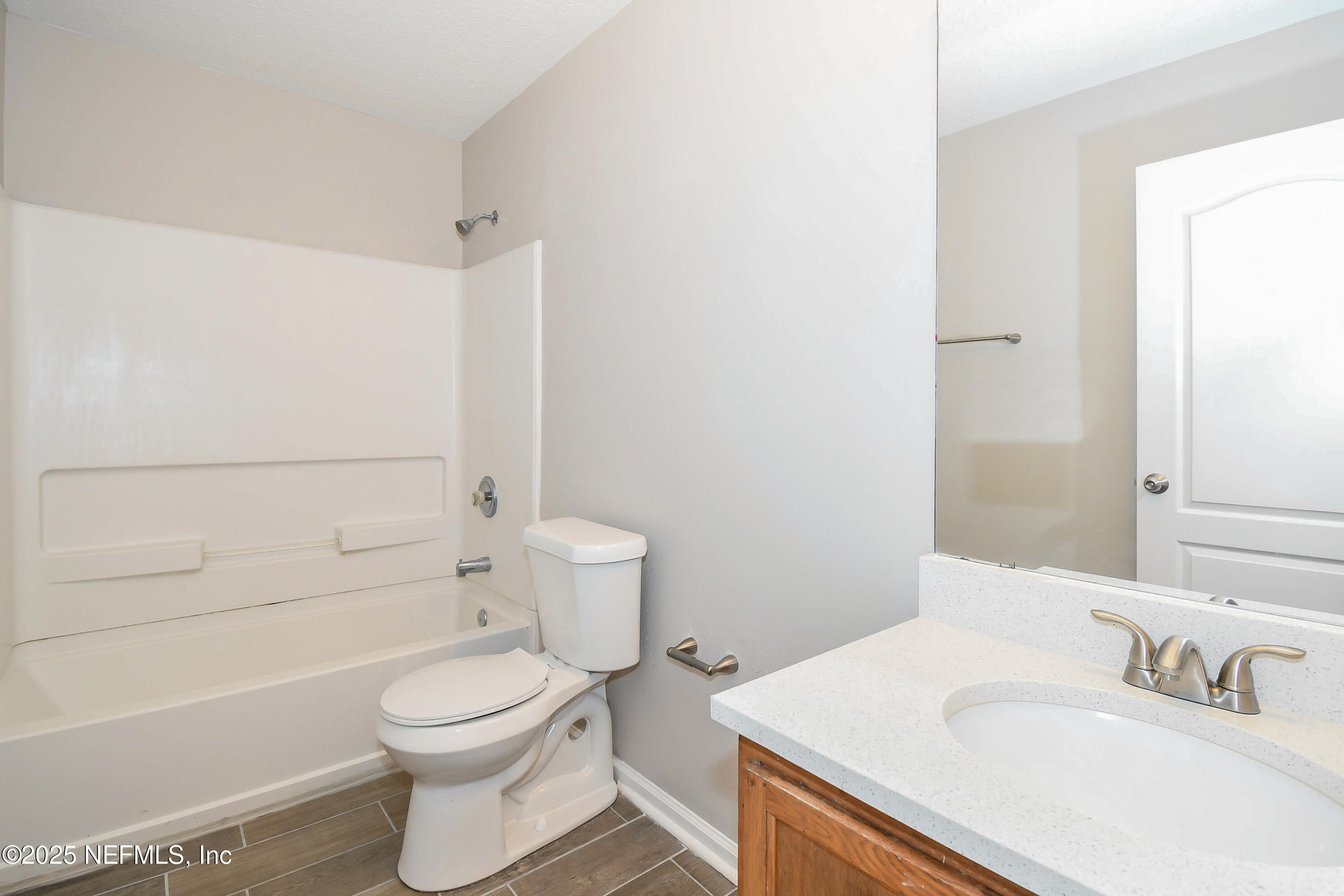 3786 Robena Road Jacksonville, FL 32218 - Photo 14 of 16 a bathroom with a sink toilet and shower