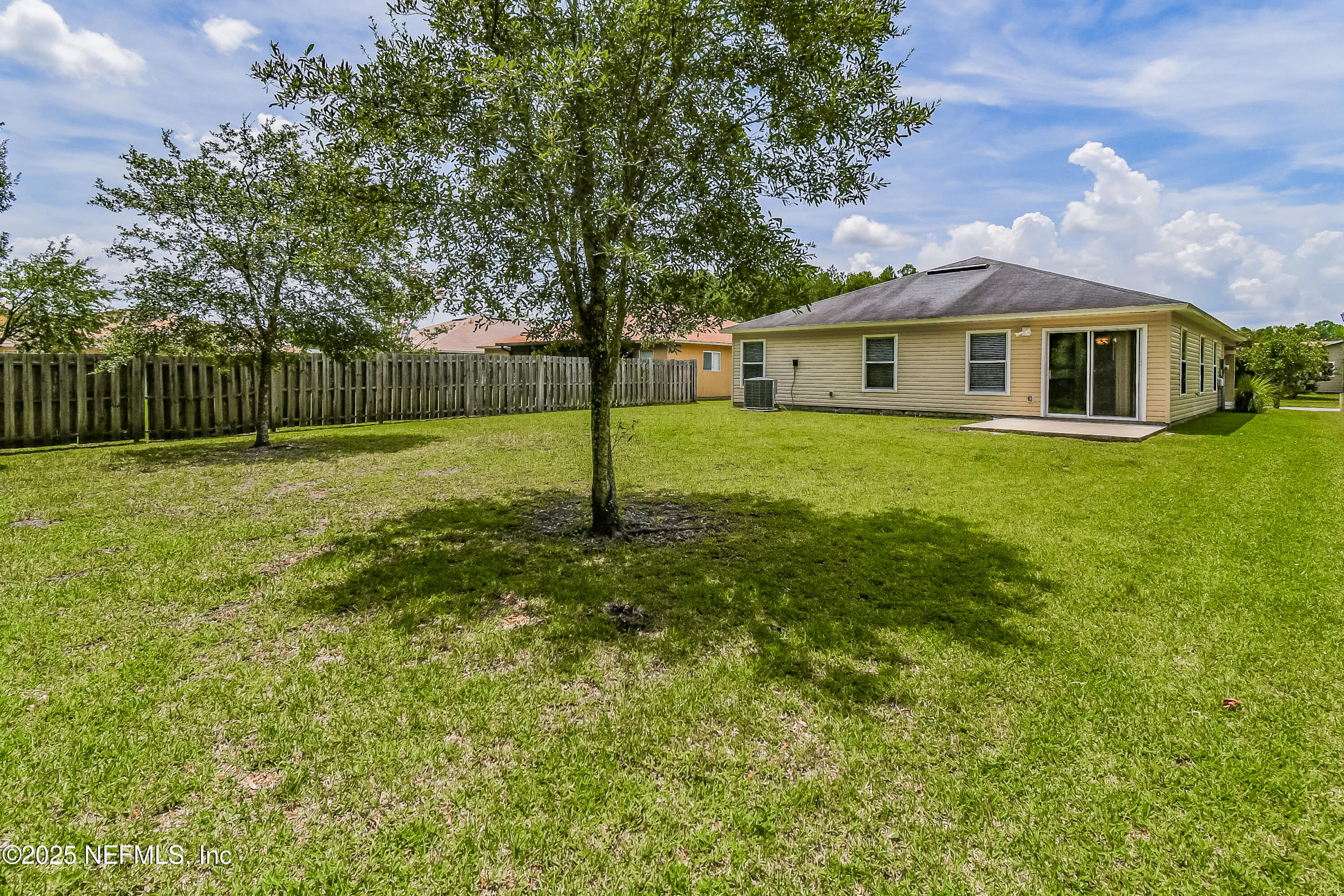 3786 Robena Road Jacksonville, FL 32218 - Photo 15 of 16 a front view of house with yard and green space