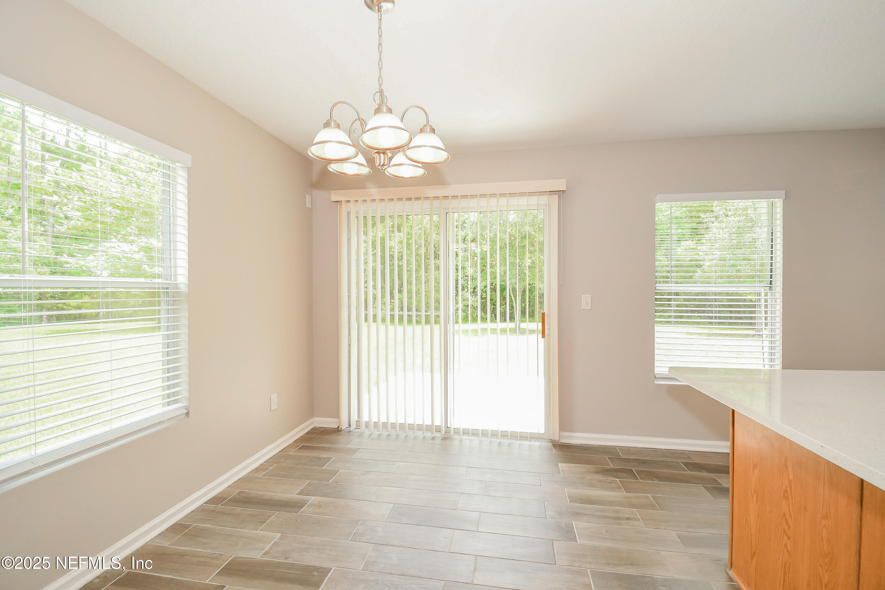 3786 Robena Road Jacksonville, FL 32218 - Photo 5 of 16 a view of an empty room with a window