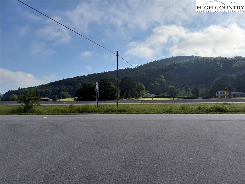 Deep Gap Drive Deep Gap, NC 28618 - Photo 20 of 31 a view of a golf course with a lake