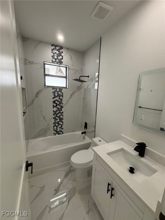 1233 Augusta Street East Lehigh Acres, FL 33974 - Photo 16 of 18 a bathroom with a sink a toilet and shower