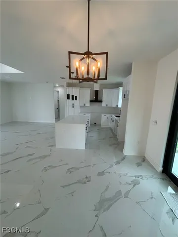 a view of a livingroom with furniture