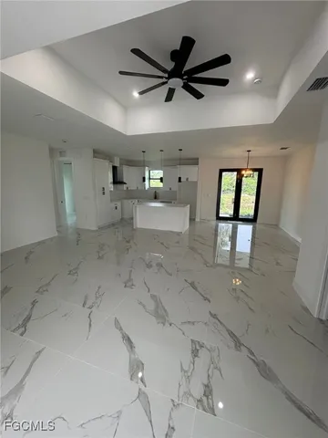 a view of a livingroom with a ceiling fan
