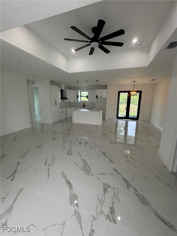 1233 Augusta Street East Lehigh Acres, FL 33974 - Photo 5 of 18 a view of a livingroom with a ceiling fan