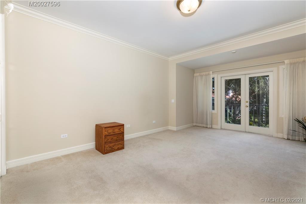 38 West High Point Road Stuart, FL 34996 - Photo 18 of 32 an empty room with windows