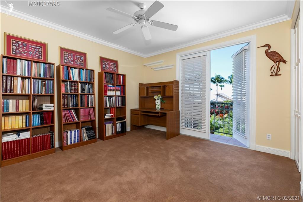 38 West High Point Road Stuart, FL 34996 - Photo 19 of 32 a view of a livingroom with furniture and staircase
