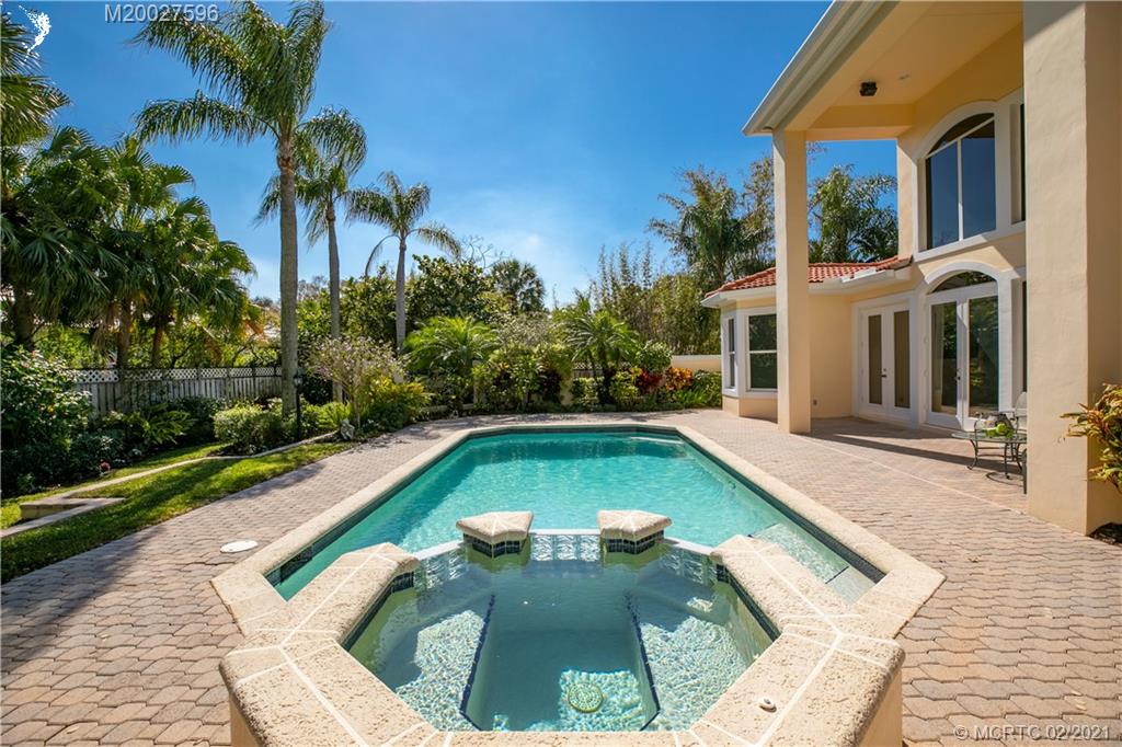 38 West High Point Road Stuart, FL 34996 - Photo 25 of 32 a view of swimming pool with a patio