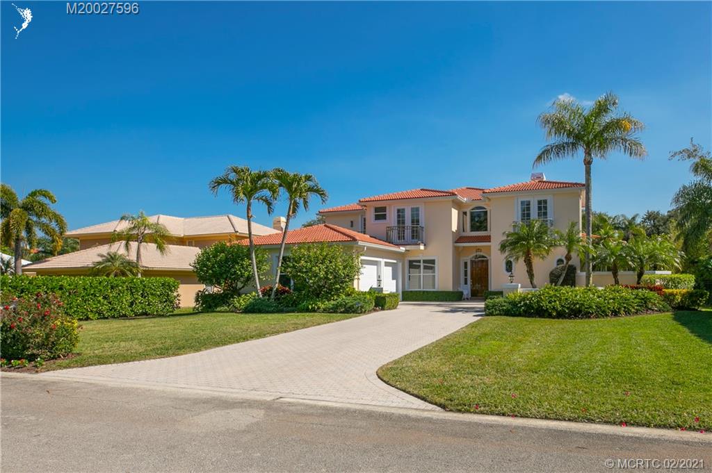 38 West High Point Road Stuart, FL 34996 - Photo 4 of 32 a front view of house with yard and green space