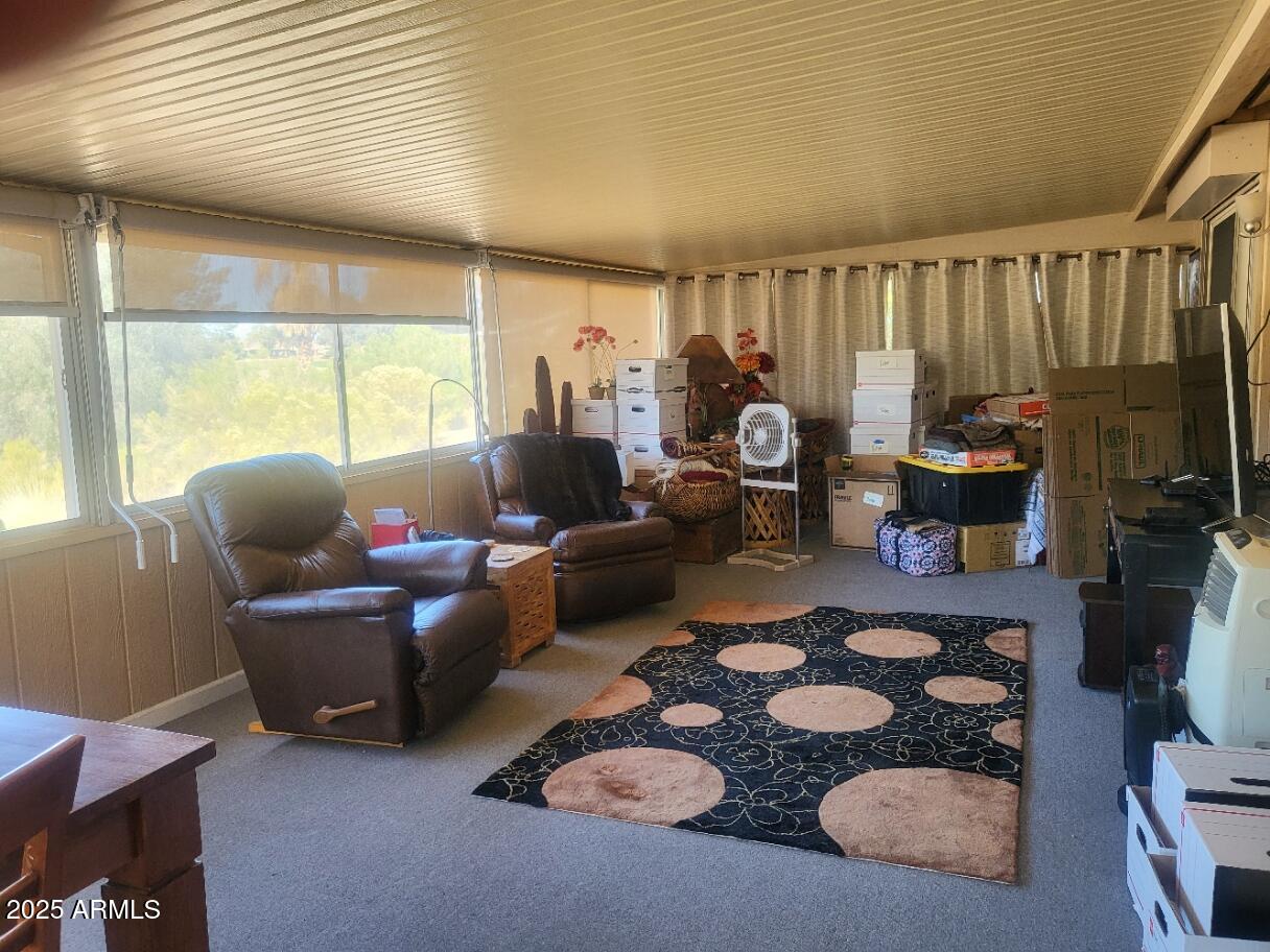 17200 West Bell Road, Unit 2301 Surprise, AZ 85374 - Photo 18 of 29 a living room with furniture and a window