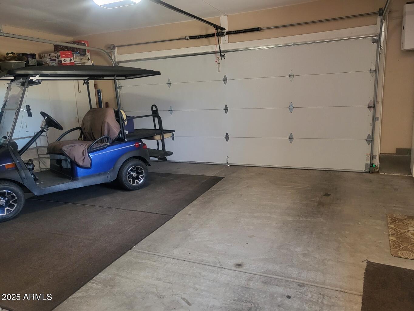 17200 West Bell Road, Unit 2301 Surprise, AZ 85374 - Photo 23 of 29 a car parked in garage