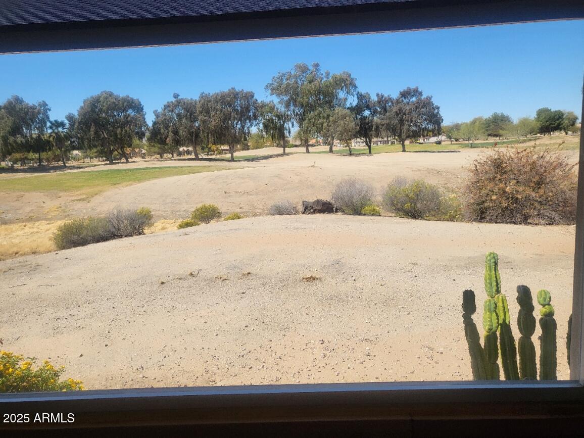 17200 West Bell Road, Unit 2301 Surprise, AZ 85374 - Photo 24 of 29 a view of a yard with an ocean view