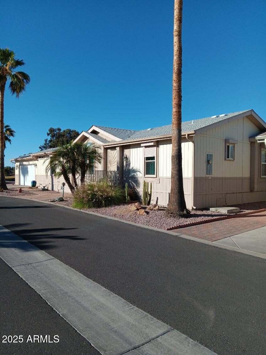17200 West Bell Road, Unit 2301 Surprise, AZ 85374 - Photo 5 of 29 a view of a house with a street