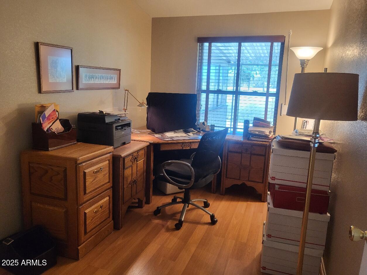 17200 West Bell Road, Unit 2301 Surprise, AZ 85374 - Photo 8 of 29 a view of a workspace with furniture and a window