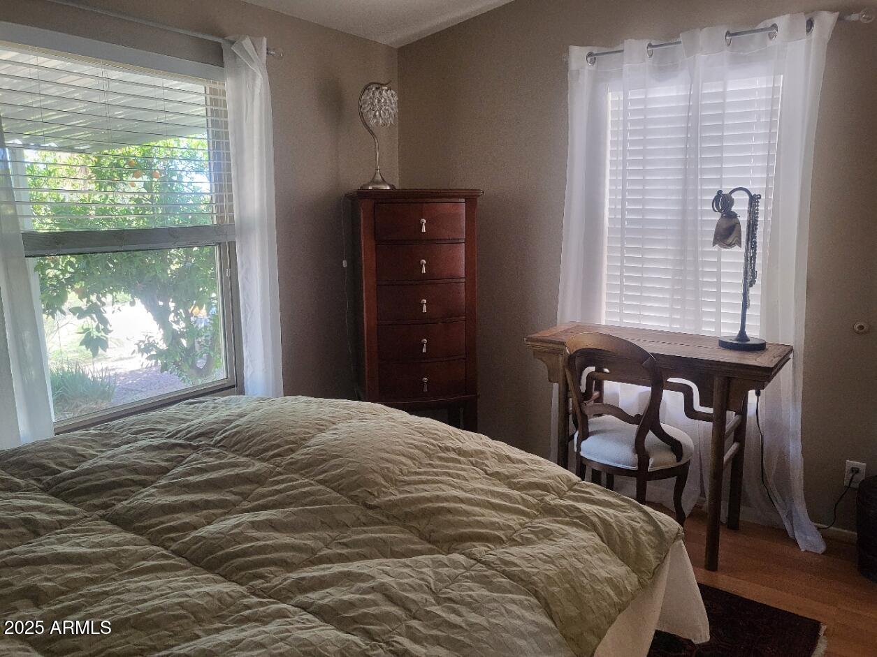 17200 West Bell Road, Unit 2301 Surprise, AZ 85374 - Photo 9 of 29 a bedroom with a bed and a window