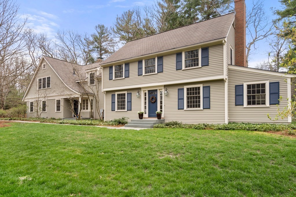 25 Aberdeen Road Weston, MA 02493 - Photo 2 of 40 a front view of a house with a garden