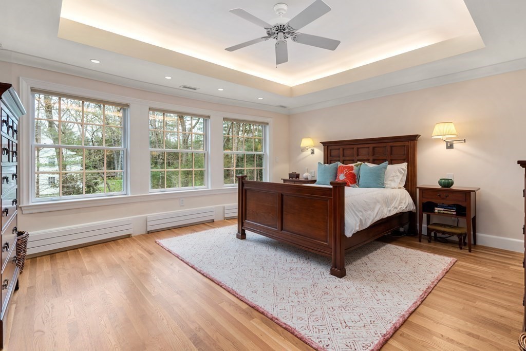 25 Aberdeen Road Weston, MA 02493 - Photo 22 of 40 a bedroom with a large bed and a large window
