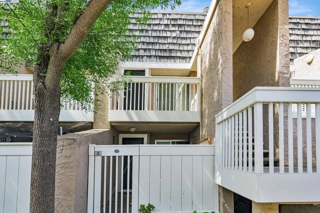 a view of a balcony with a swing