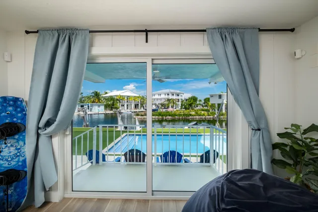 a view of balcony and front door