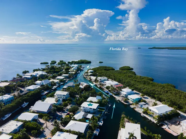 an aerial view of a city with lots of residential buildings