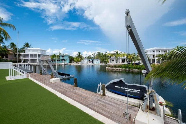 a view of a lake with a deck and a lake view