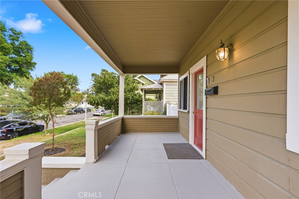 3756 Locust Street Riverside, CA 92501 - Photo 4 of 22 a view of a porch with furniture and a yard