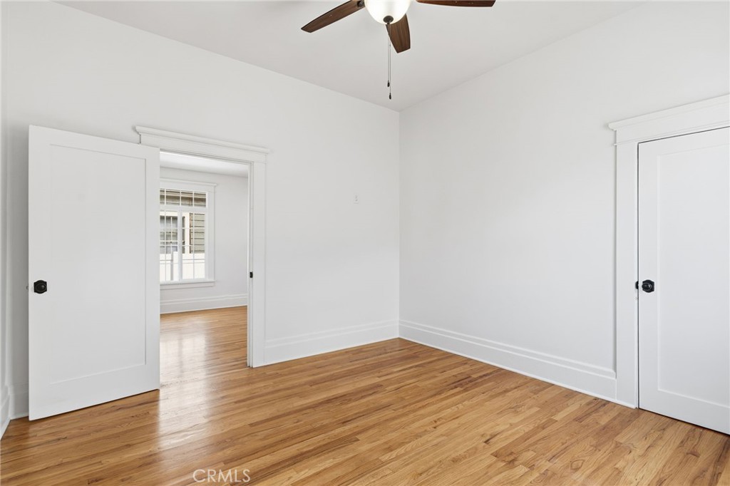 3756 Locust Street Riverside, CA 92501 - Photo 8 of 22 a view of empty room with wooden floor