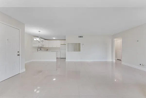 a bathroom with a sink a toilet and a shower