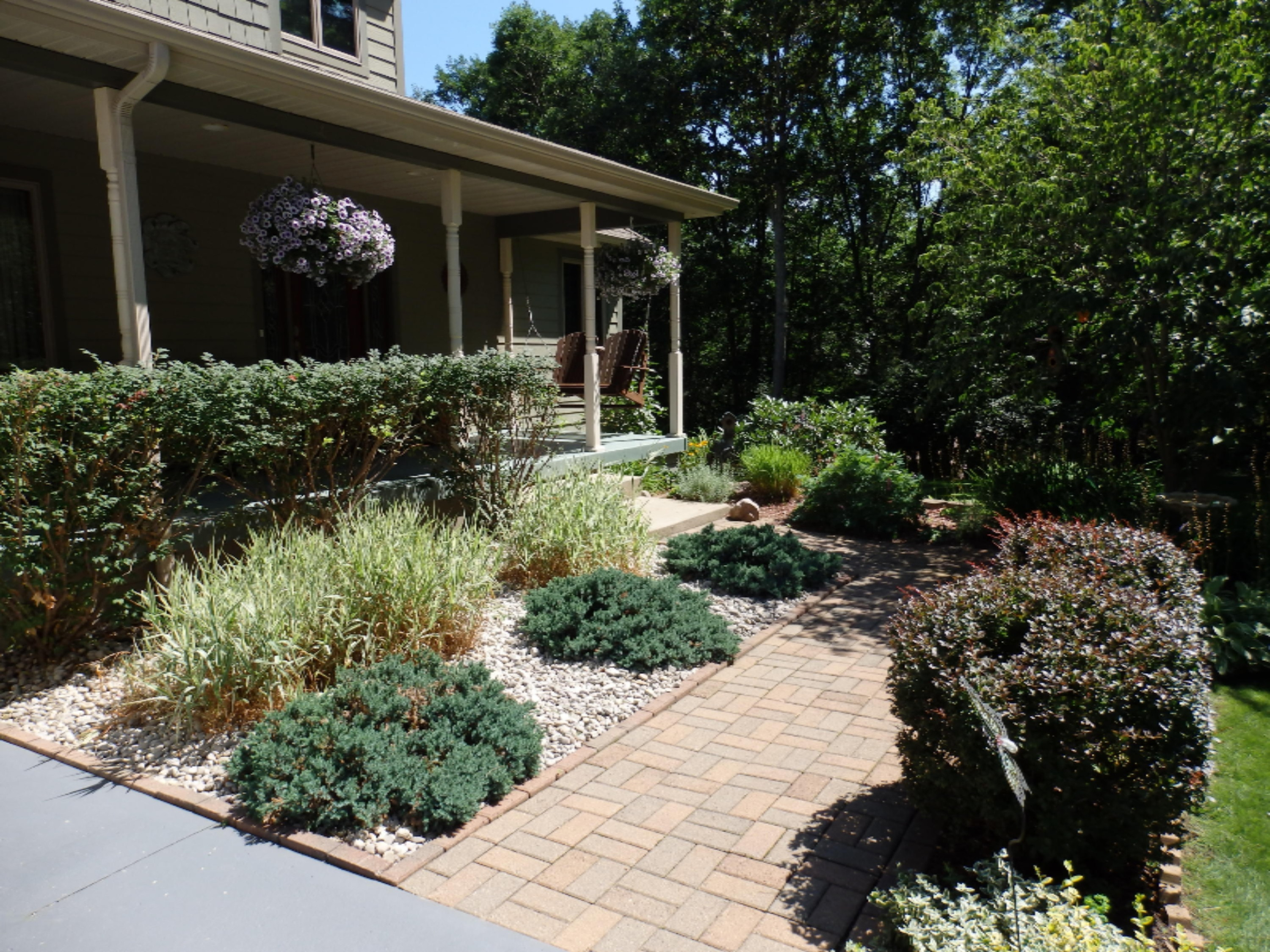 3845 Linke Road Manistee, MI 49660 - Photo 3 of 58 close up of front landscaped walk
