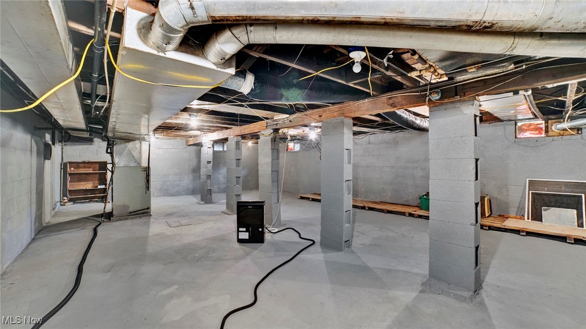337 Pomerene Road Mansfield, OH 44906 - Photo 20 of 32 Basement featuring heating unit