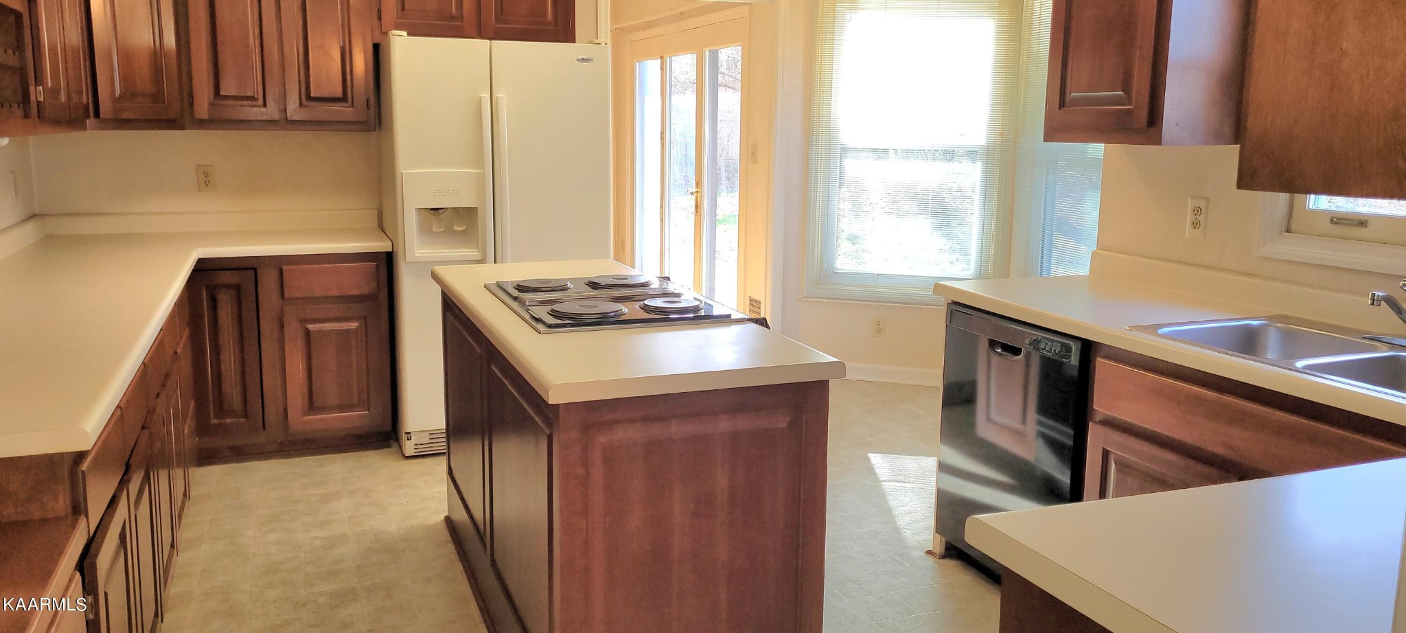 115 Claremont Road Oak Ridge, TN 37830 - Photo 7 of 39 a kitchen with stainless steel appliances granite countertop a sink stove and refrigerator