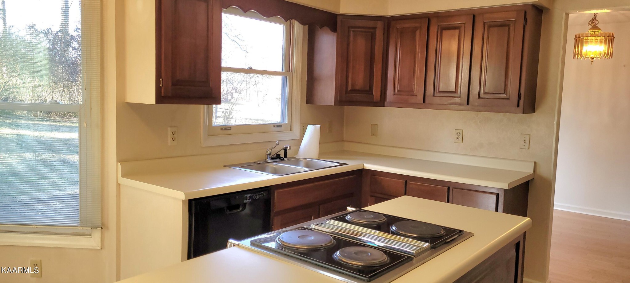 115 Claremont Road Oak Ridge, TN 37830 - Photo 10 of 39 a kitchen with a sink stove and cabinets