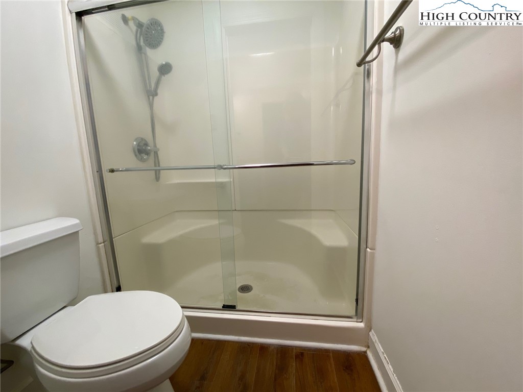 3520 Colony Road, Unit F Charlotte, NC 28211 - Photo 16 of 18 a bathroom with a shower and a toilet