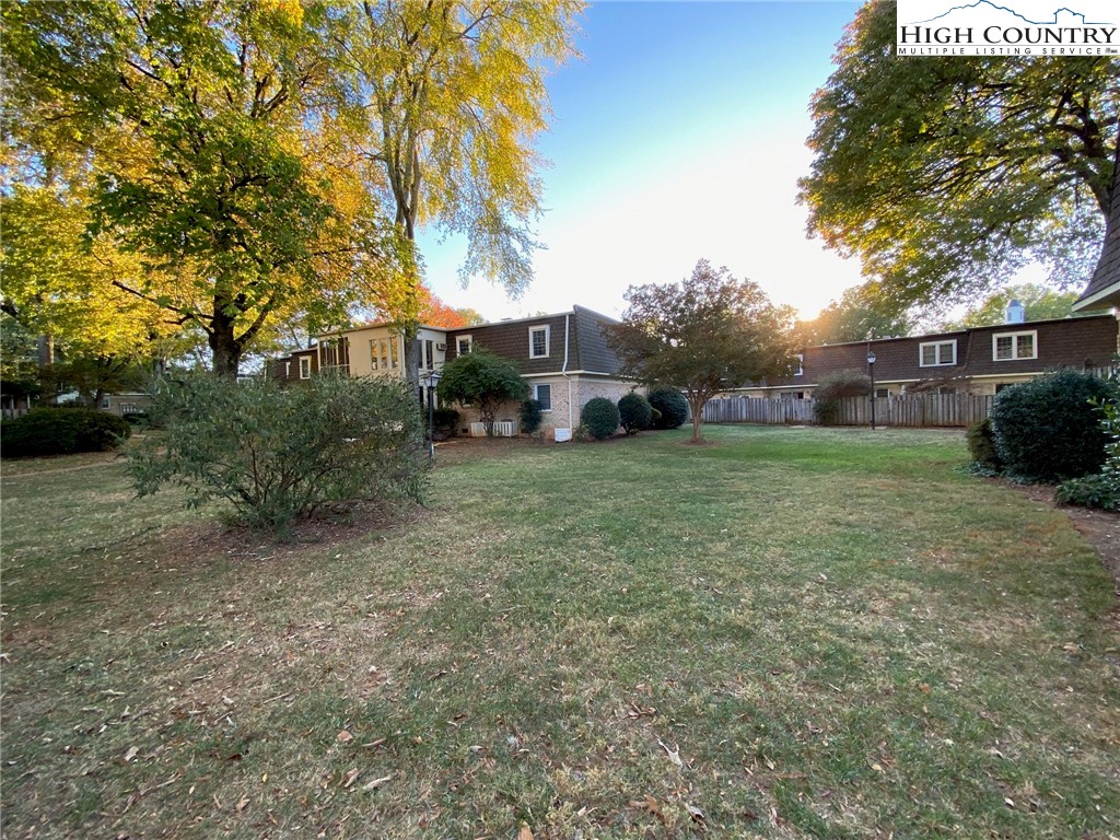 3520 Colony Road, Unit F Charlotte, NC 28211 - Photo 18 of 18 a view of a house with a yard