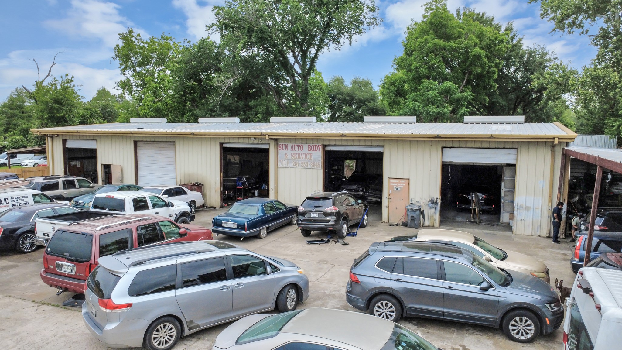 703 East Little York Road Houston, TX 77037 - Photo 2 of 14 a car parked in front of house
