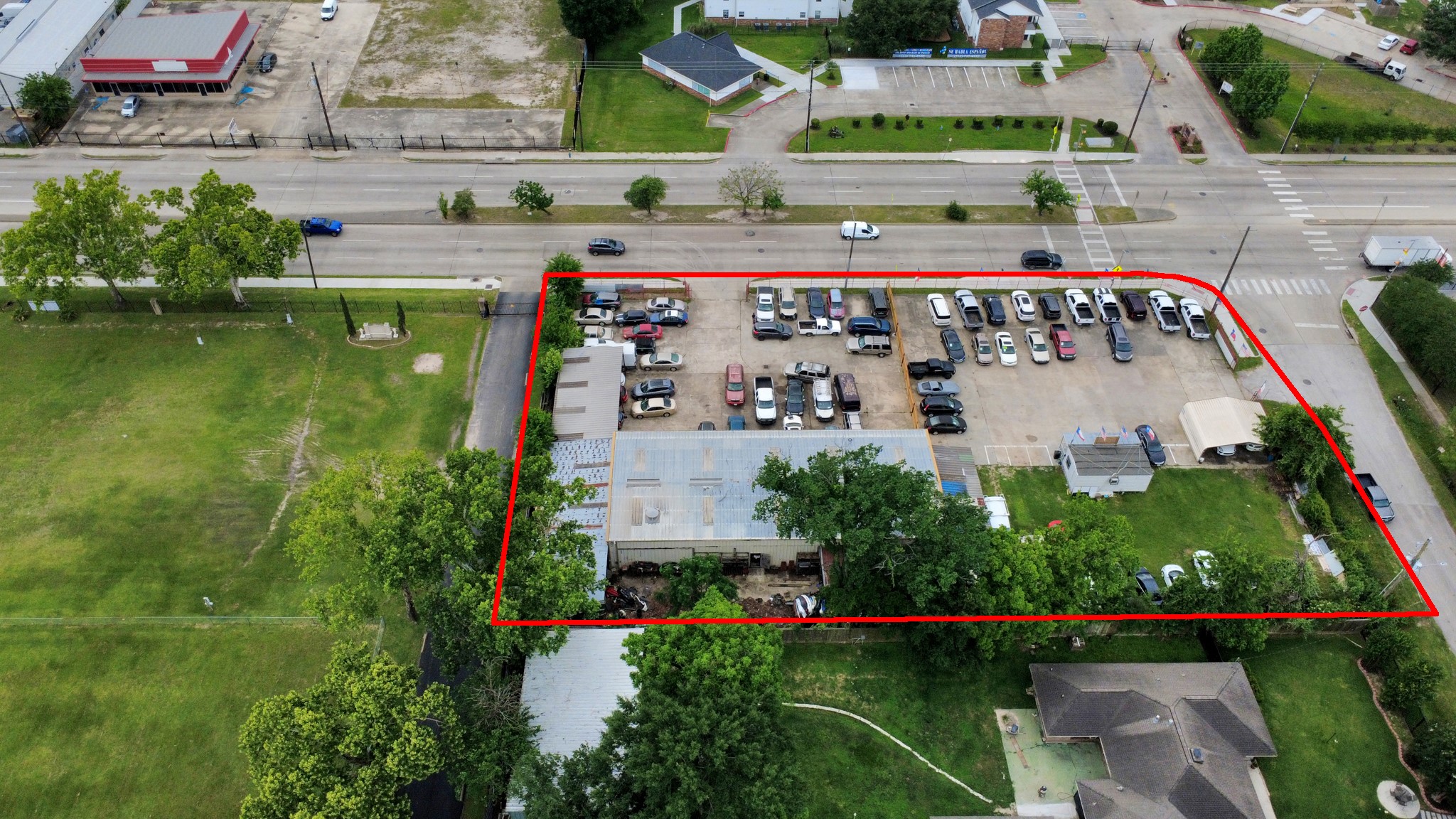 703 East Little York Road Houston, TX 77037 - Photo 5 of 14 an aerial view of house with swimming pool and tennis court