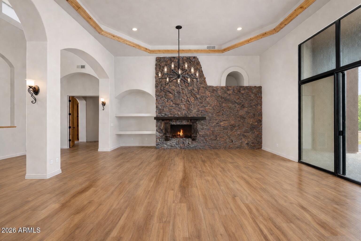 6646 East Lone Mountain Road Cave Creek, AZ 85331 - Photo 15 of 37 a view of a kitchen with a refrigerator and a wooden floor