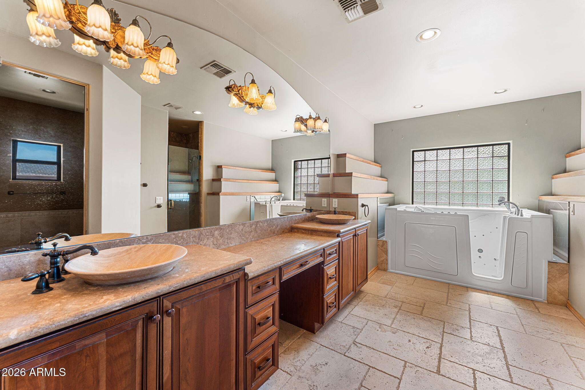 6646 East Lone Mountain Road Cave Creek, AZ 85331 - Photo 18 of 37 a kitchen with a sink stove and cabinets