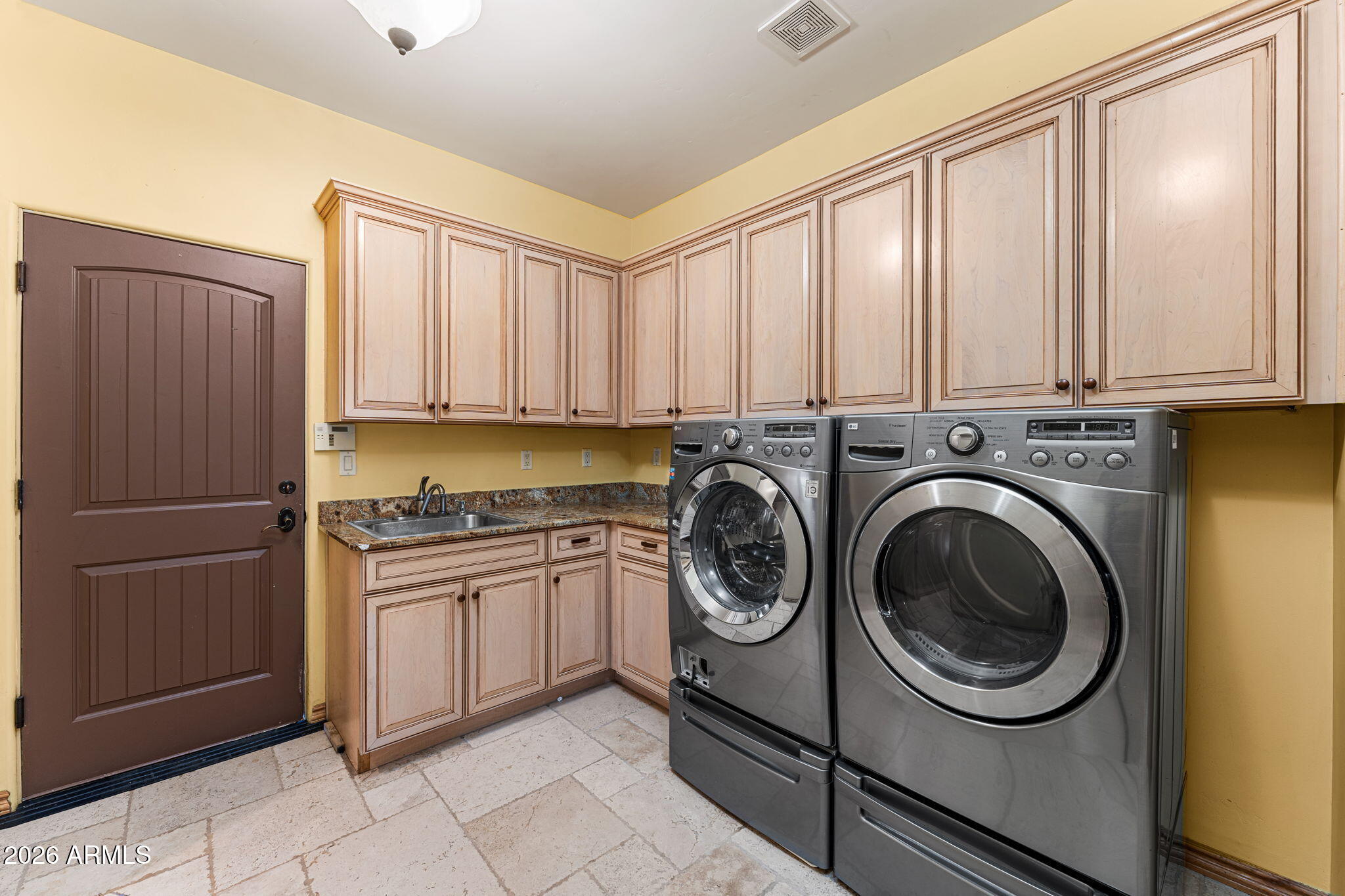 6646 East Lone Mountain Road Cave Creek, AZ 85331 - Photo 26 of 37 a utility room with sink dryer and washer