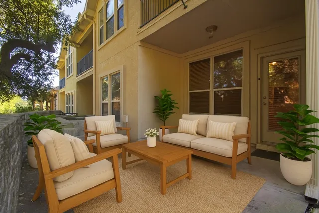 a building outdoor space with patio furniture
