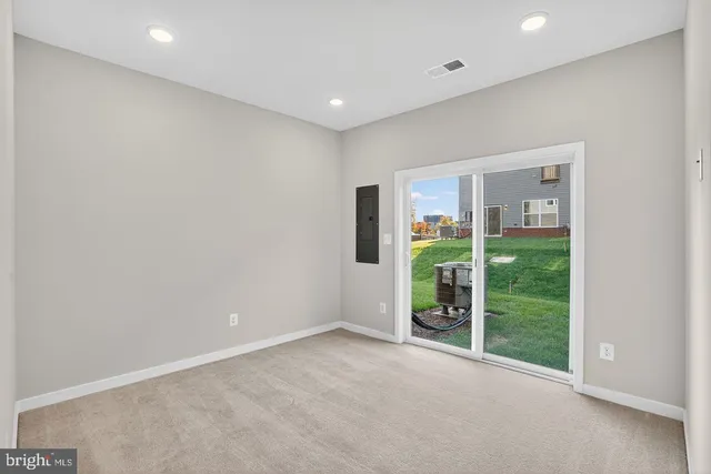 a view of an empty room with window