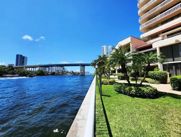 a view of building with outdoor space and seating area