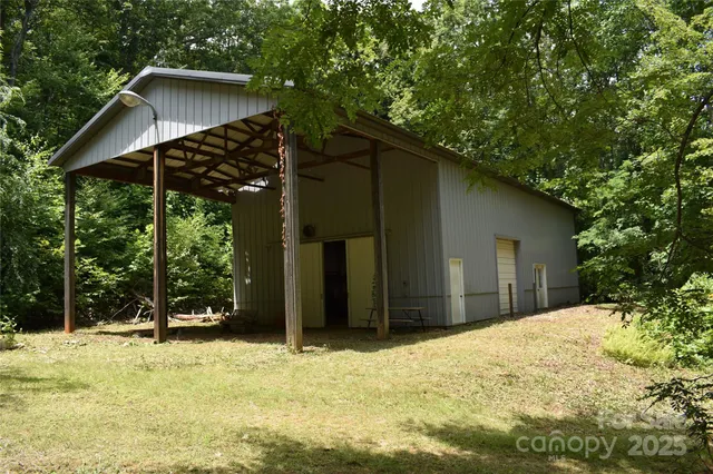 a backyard of a house with trees