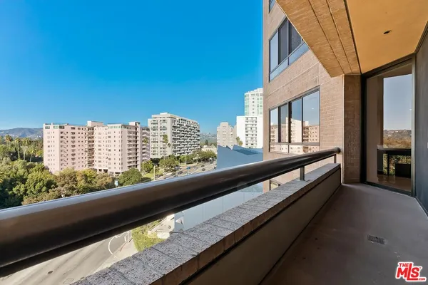 a view of city from a balcony