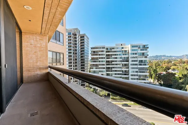 a city view from a balcony