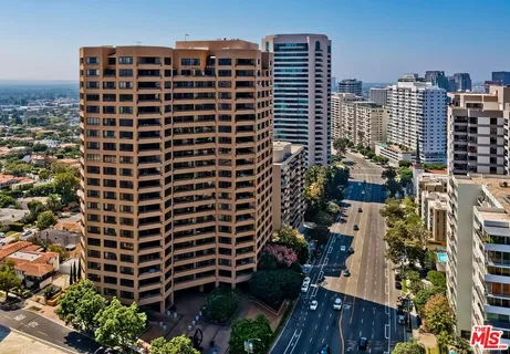 a city view with tall buildings