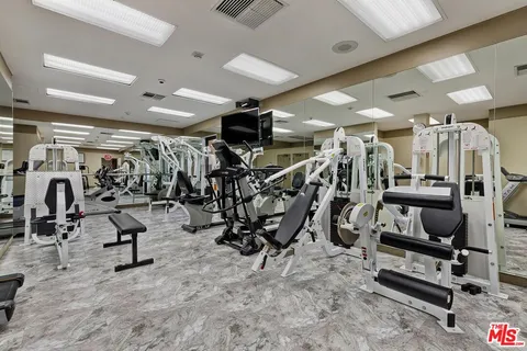 a view of a room with gym equipment