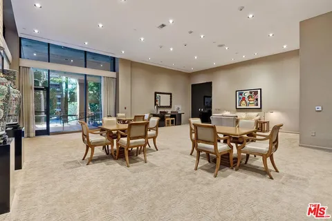 a group of people sitting in a living room